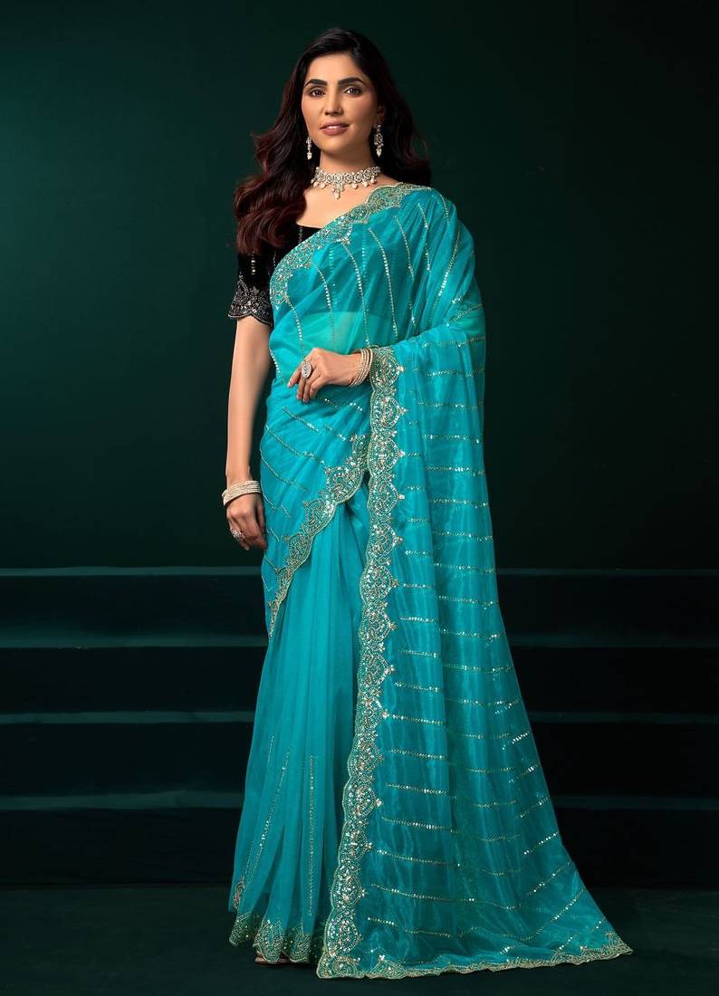 Sky blue embroidered embellished bollywood net saree with blouse