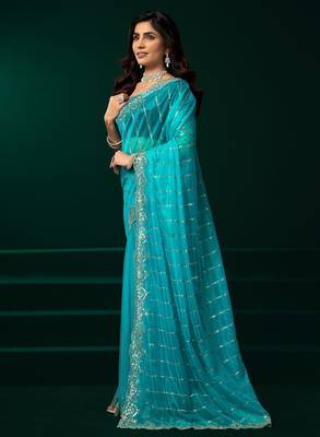 Sky blue embroidered embellished bollywood net saree with blouse 3