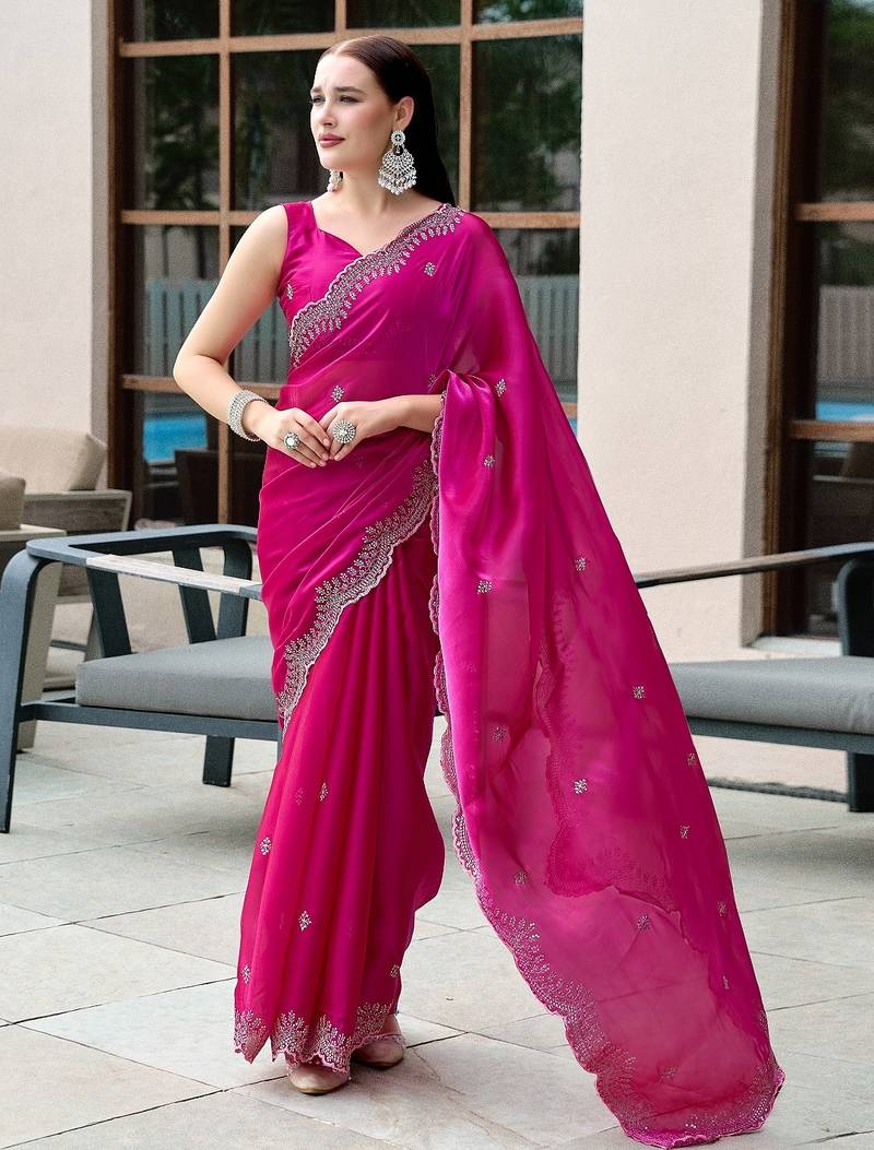 Rani pink embroidered embellished shimmer chiffon bollywood saree with blouse