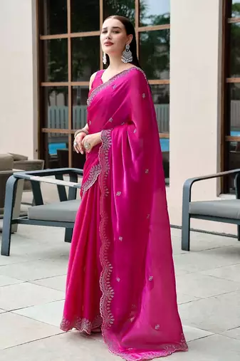 Rani pink embroidered embellished shimmer chiffon bollywood saree with blouse