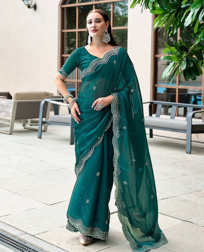 Teal green embroidered embellished shimmer chiffon bollywood saree with blouse