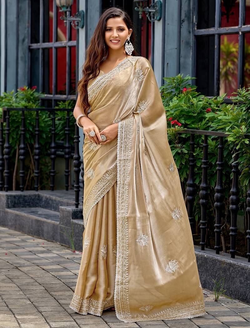 Beige embroidered embellished shimmer chiffon bollywood saree with blouse