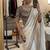 Off White Color embroidery sequence buttis  and work Satin Saree