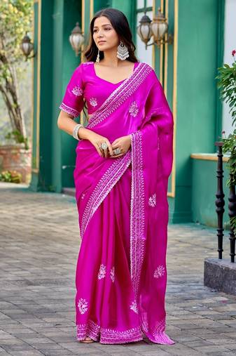 Rani pink embroidered embellished shimmer chiffon bollywood saree with blouse