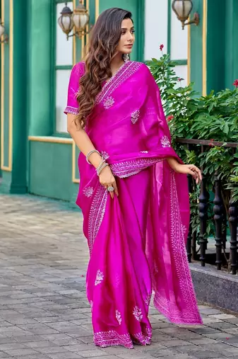 Rani pink embroidered embellished shimmer chiffon bollywood saree with blouse