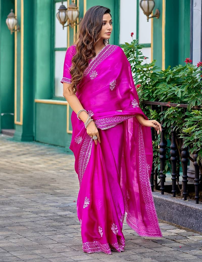 Rani pink embroidered embellished shimmer chiffon bollywood saree with blouse
