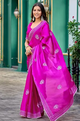 Rani pink embroidered embellished shimmer chiffon bollywood saree with blouse