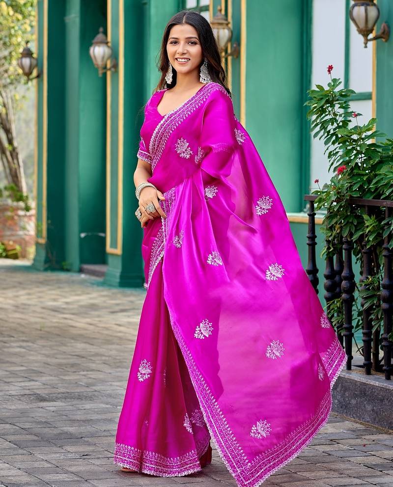 Rani pink embroidered embellished shimmer chiffon bollywood saree with blouse