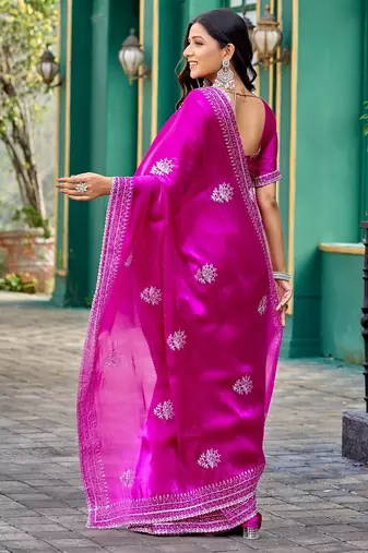 Rani pink embroidered embellished shimmer chiffon bollywood saree with blouse