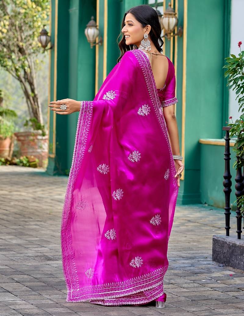 Rani pink embroidered embellished shimmer chiffon bollywood saree with blouse