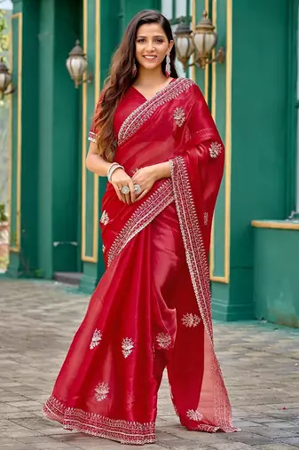 Red embroidered embellished shimmer chiffon bollywood saree with blouse