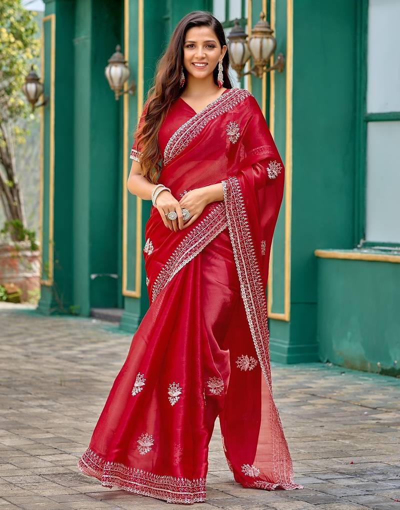 Red embroidered embellished shimmer chiffon bollywood saree with blouse
