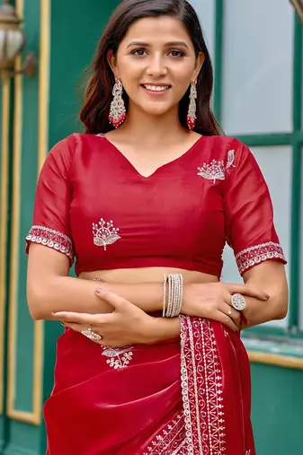 Red embroidered embellished shimmer chiffon bollywood saree with blouse