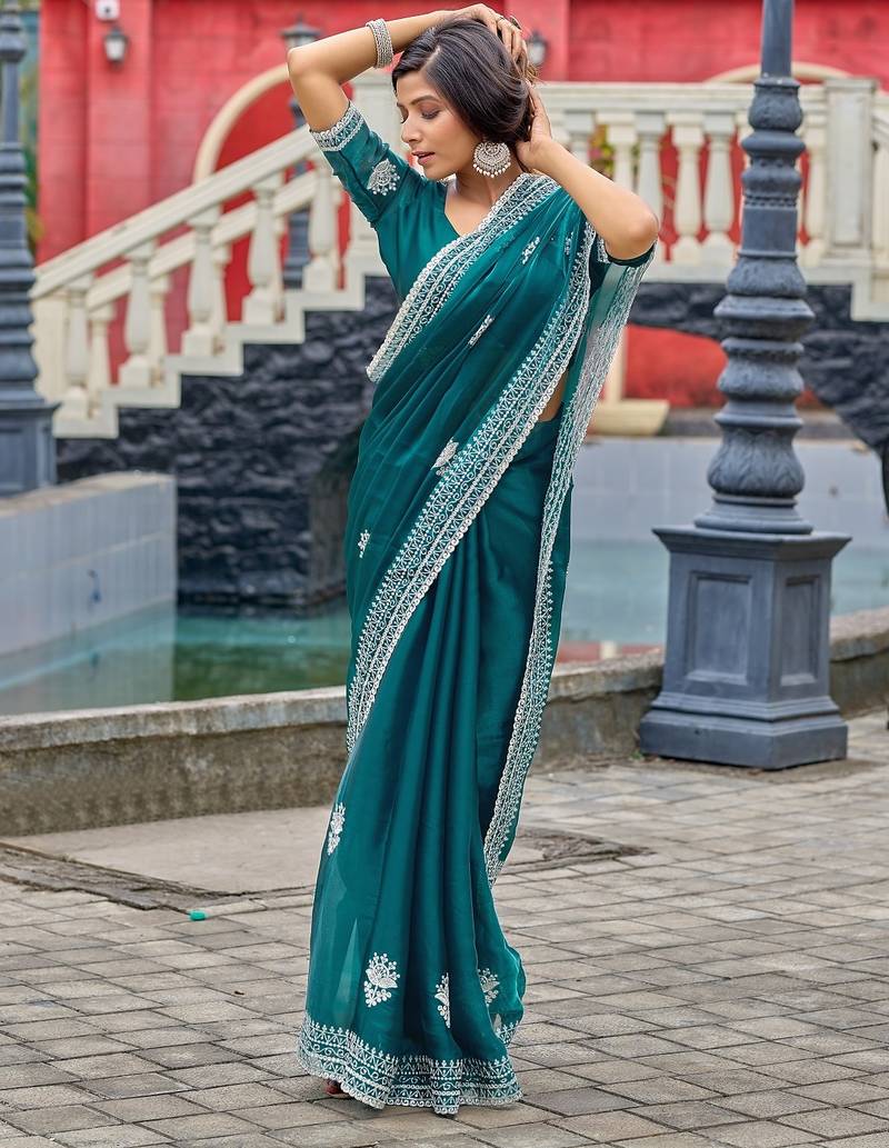 Teal blue embroidered embellished shimmer chiffon bollywood saree with blouse