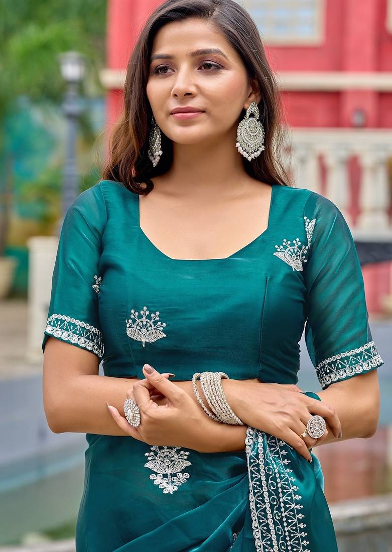 Teal blue embroidered embellished shimmer chiffon bollywood saree with blouse