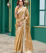 Beige embroidered embellished shimmer chiffon bollywood saree with blouse