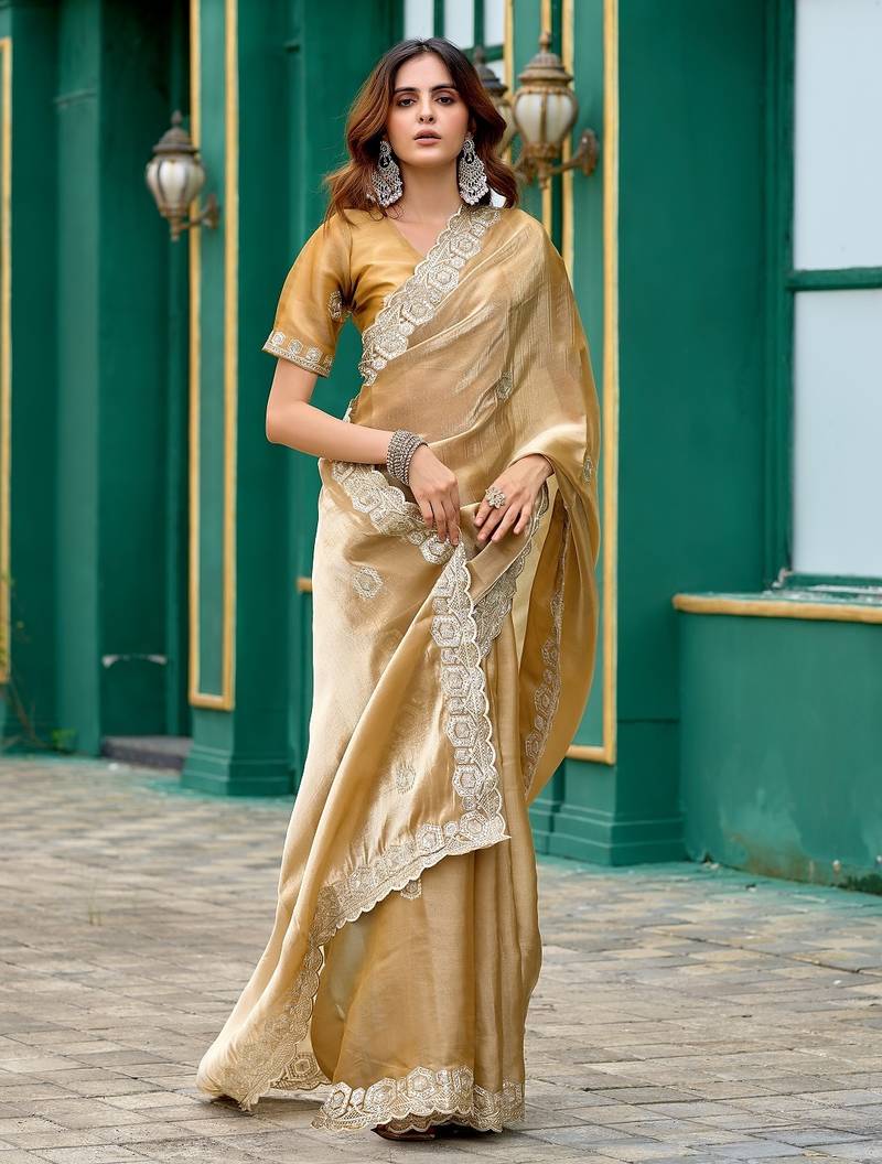 Beige embroidered embellished shimmer chiffon bollywood saree with blouse