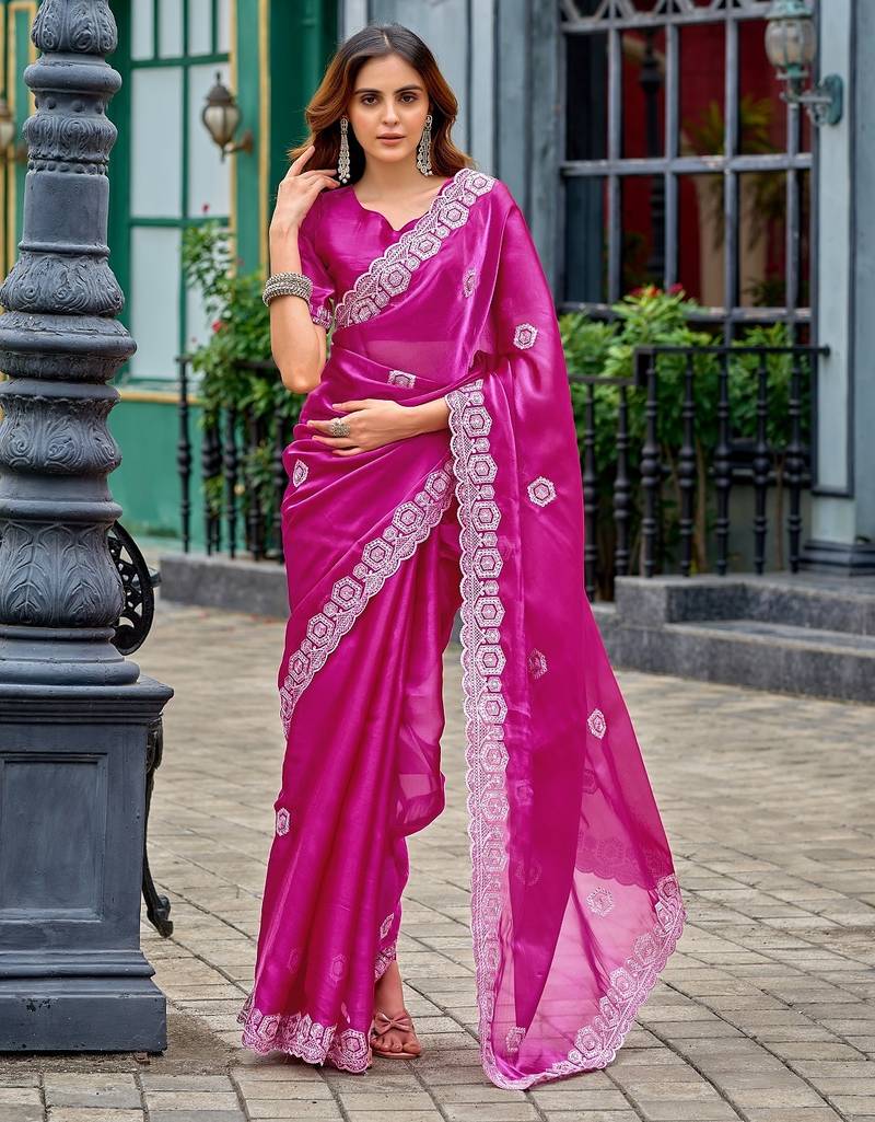 Rani pink embroidered embellished shimmer chiffon bollywood saree with blouse