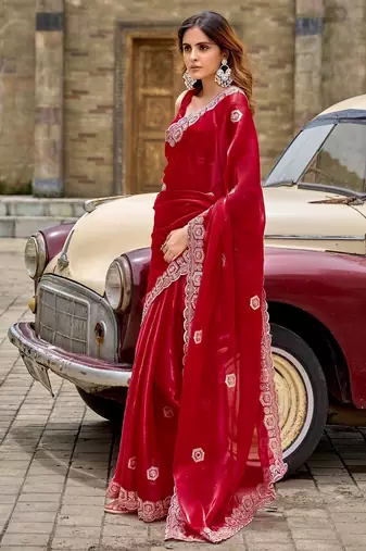 Red embroidered embellished shimmer chiffon bollywood saree with blouse