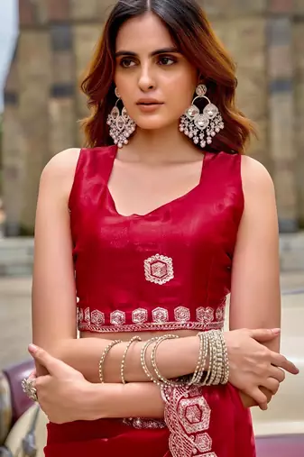 Red embroidered embellished shimmer chiffon bollywood saree with blouse