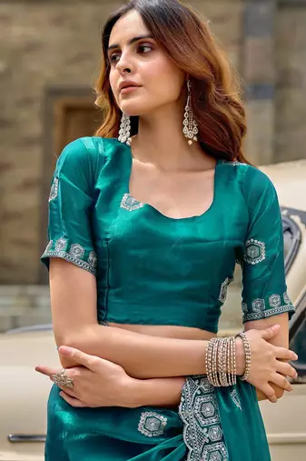 Teal blue embroidered embellished shimmer chiffon bollywood saree with blouse