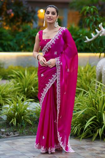 Dark pink embroidered shimmer chiffon bollywood saree with blouse