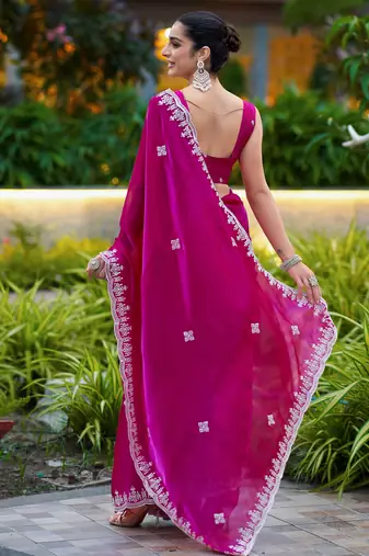 Dark pink embroidered shimmer chiffon bollywood saree with blouse