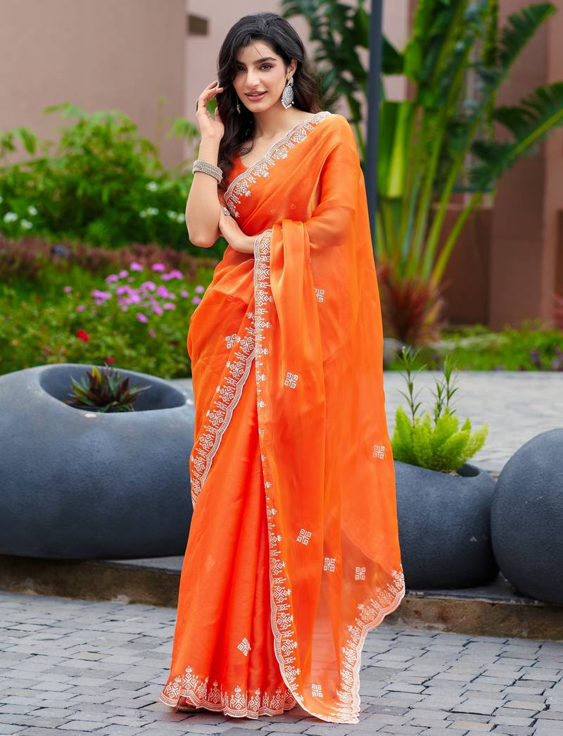 Orange embroidered shimmer chiffon bollywood saree with blouse