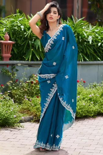 Teal blue embroidered shimmer chiffon bollywood saree with blouse