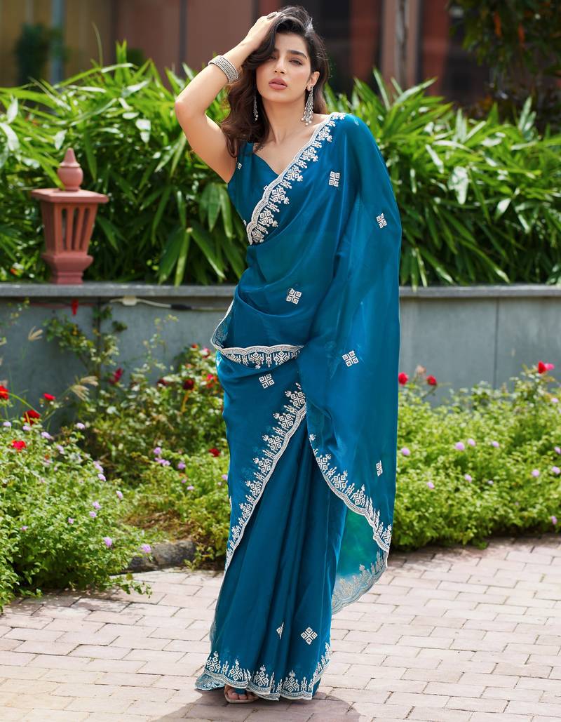 Teal blue embroidered shimmer chiffon bollywood saree with blouse