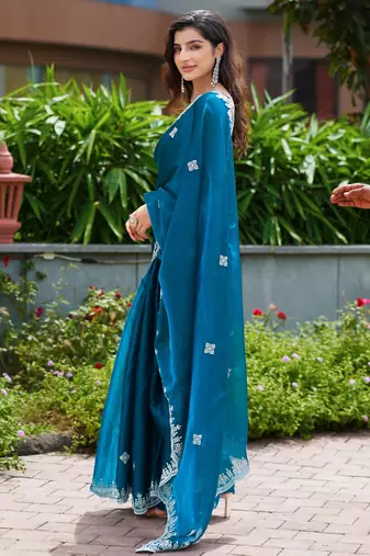 Teal blue embroidered shimmer chiffon bollywood saree with blouse