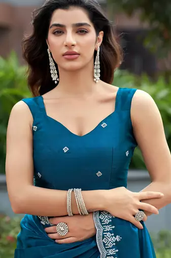 Teal blue embroidered shimmer chiffon bollywood saree with blouse