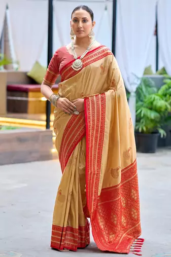 Beige woven silk blend paithani saree with blouse