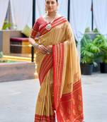 Beige woven silk blend paithani saree with blouse