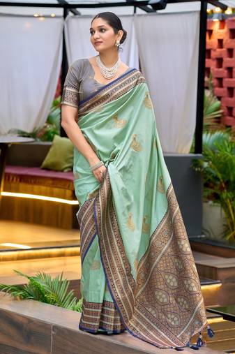 Mint green woven silk blend paithani saree with blouse
