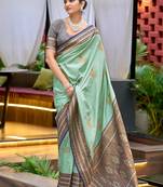 Mint green woven silk blend paithani saree with blouse