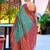 Teal green woven silk blend paithani saree with blouse