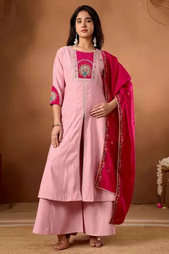 Designer front-slit kurta paired with wide-leg palazzo pants and a dupatta.
