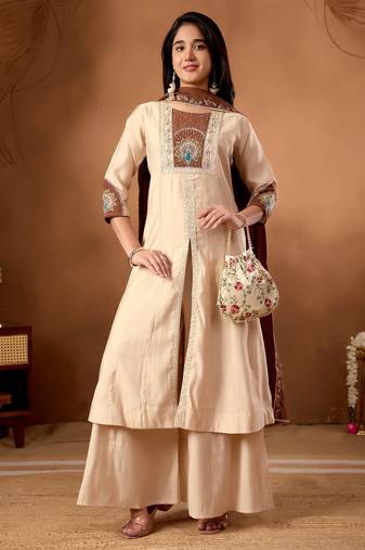 Designer front-slit kurta paired with wide-leg palazzo pants and a dupatta.