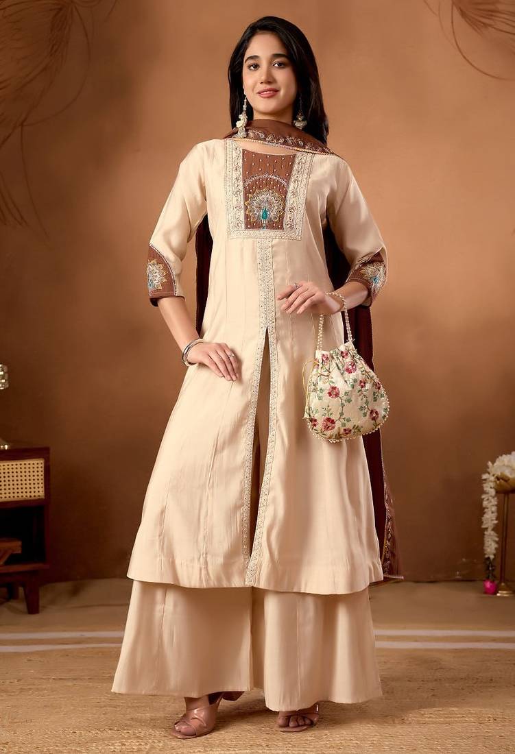 Designer front-slit kurta paired with wide-leg palazzo pants and a dupatta.
