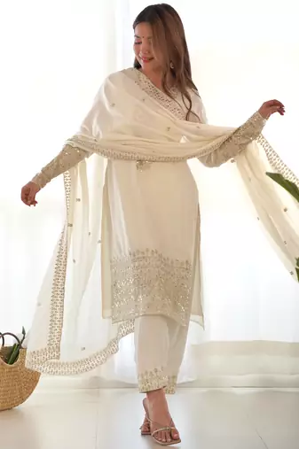 white silk salwar suit with elegant design for festive wear