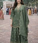 Green color beautiful and ethnic roman silk fabric designer embroidered suit