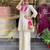 Elegant off-white embroidered kurti set with pink yoke design