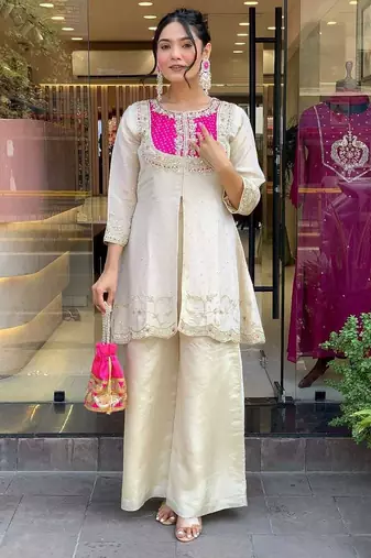 Elegant off-white embroidered kurti set with pink yoke design