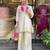 Elegant off-white embroidered kurti set with pink yoke design