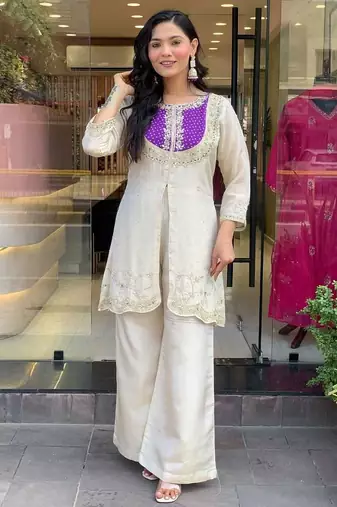 Elegant off-white embroidered kurti set with purple yoke design
