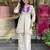Elegant off-white embroidered kurti set with purple yoke design