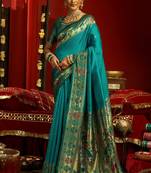 Teal green woven paithani silk saree with blouse