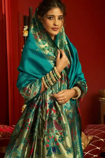 Teal green woven paithani silk saree with blouse