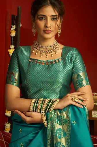 Teal green woven paithani silk saree with blouse